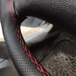 دور فرمون دوختنی چرم سوزنی مدل مشکی دوخت قرمز